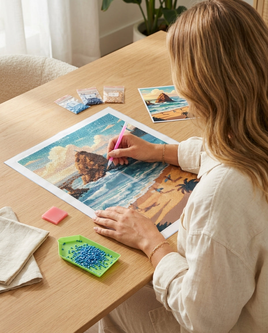 Personne réalisant le Diamond Painting Plage de Biarritz, vue de profil