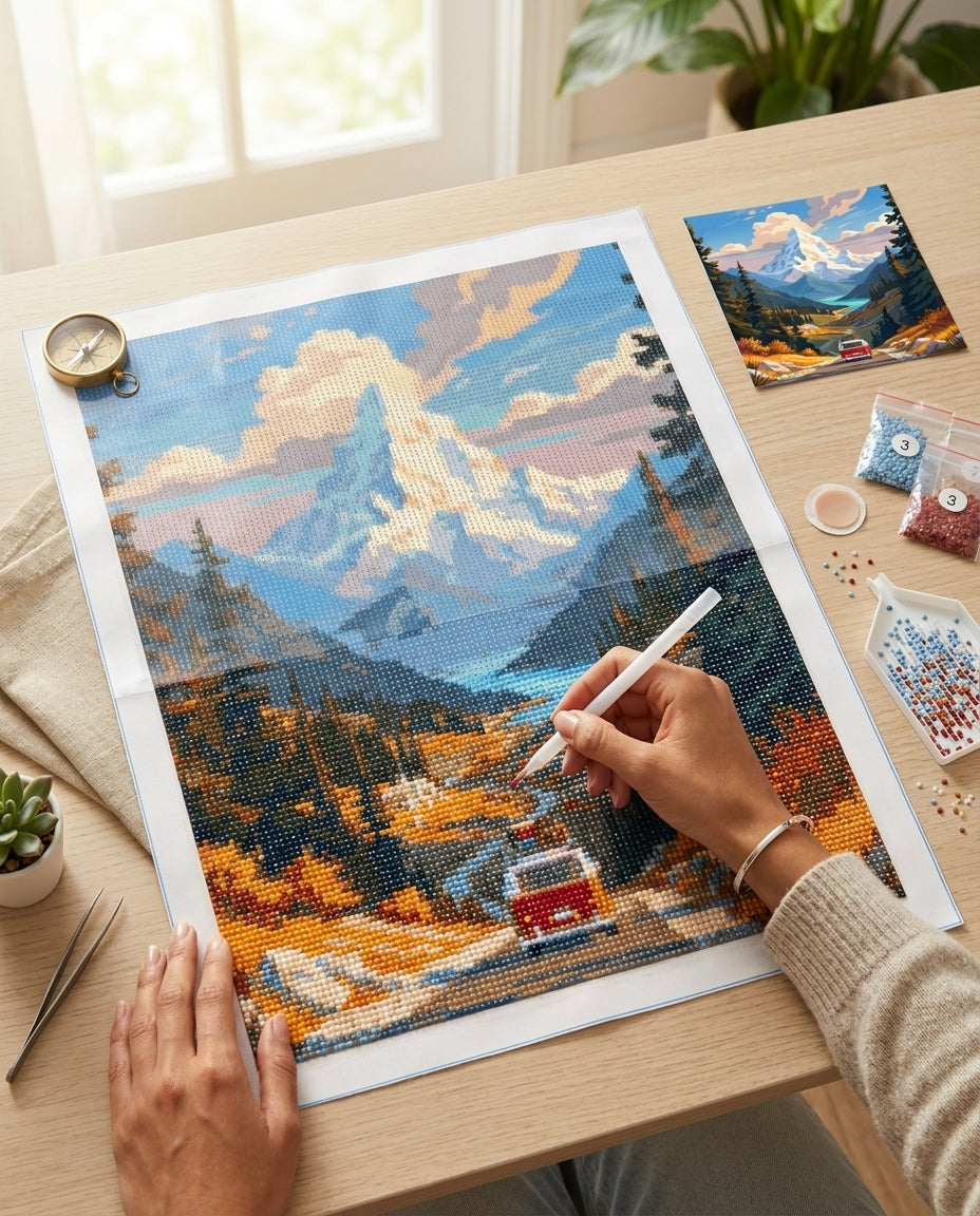 Diamond Painting Van Rétro Montagne en cours de réalisation, vue du dessus du plan de travail